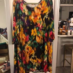 Dress knee length flared 3/4 sleeves.